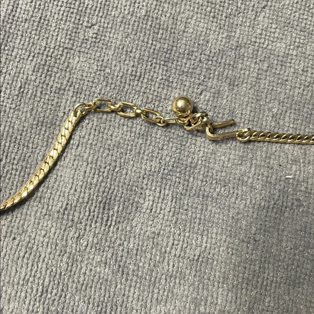 Vintage Avon Goldtone Whale Tail Necklace with Tassel